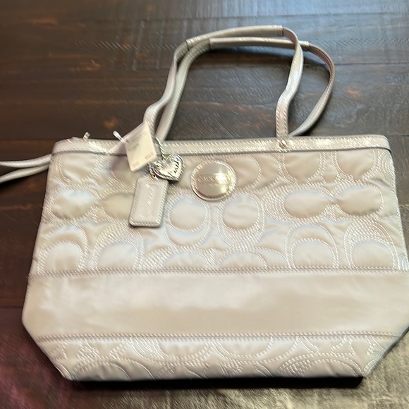 Coach Handbags - NWT GRAY QUILTED COACH BAG.Comes from a smoke free home.